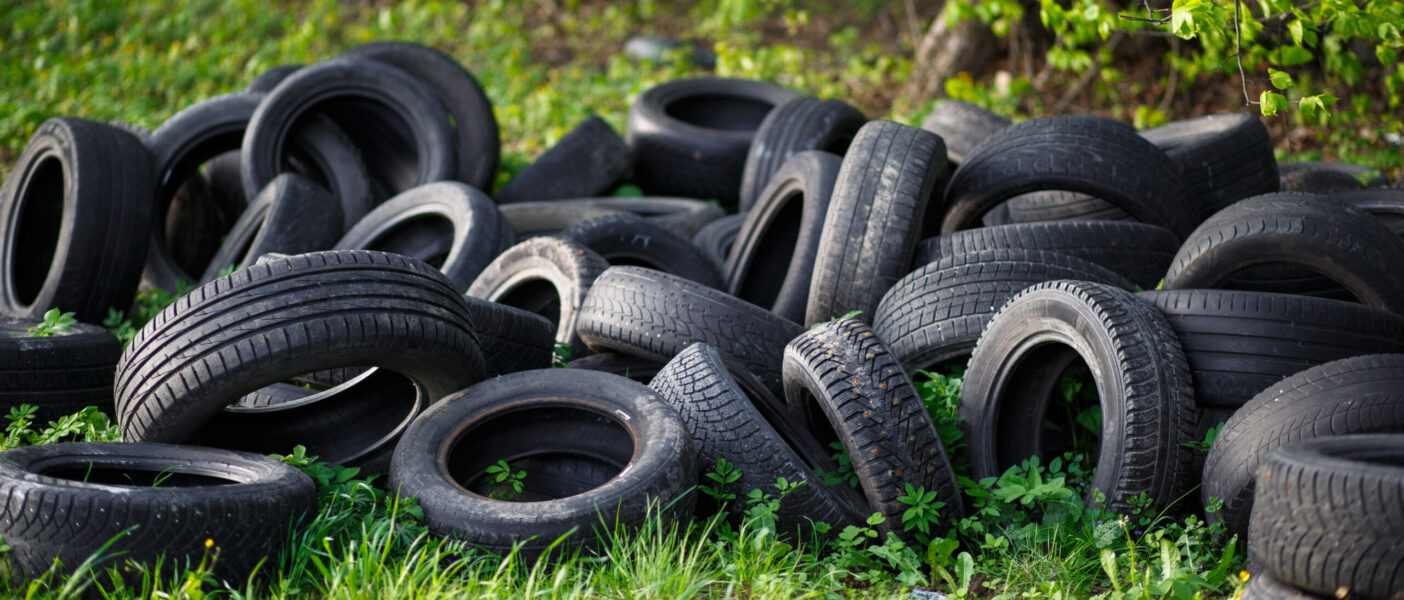 Image of tires in the lawn area