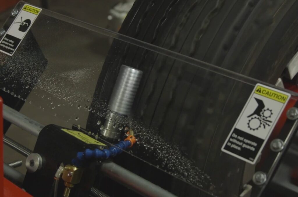 "Close-up of tire with high-density siping cuts for improved winter grip